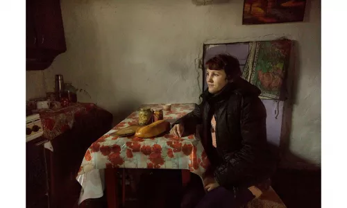 Quintina Valero - Tatiana in her kitchen, Ukraine. From “Life after Chernobyl” series