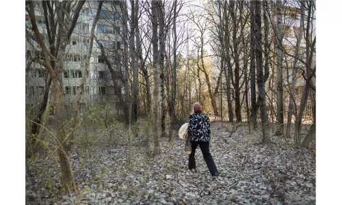 Quintina Valero - Valentina returns to her home, Pripyat (Ukraine). From “Life after Chernobyl” series